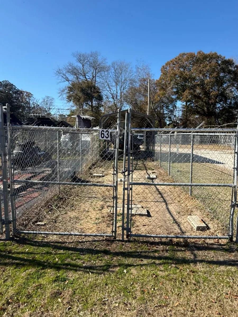 Boat storage space 63 with a shelter and fenced access